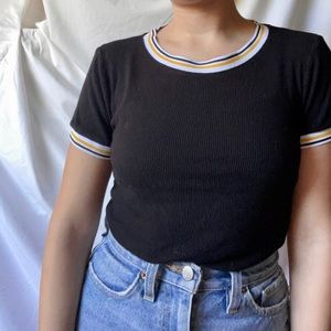 black shirt with striped neckline and sleeves